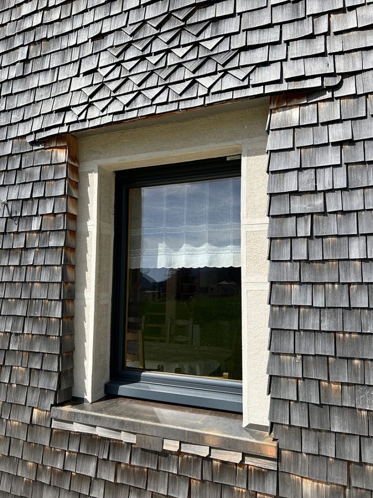 Wooden roof tile